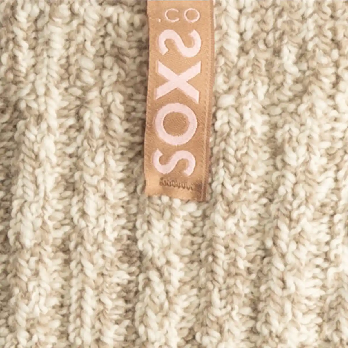 SOXS Beige wollen sokken Label Amberlight Antislip detail stof