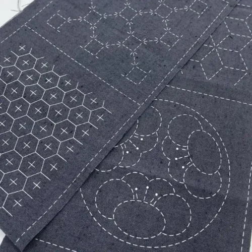 Zeven schatten voorgedrukte stof 105x15cm blauwgrijs